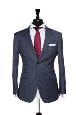 Front Mannequin View of Pocket Square's Blue Houndstooth Suit with a notch lapel and black buttons